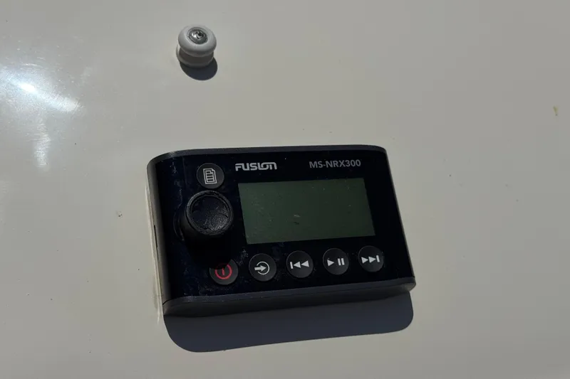 Slide: The Image of Fusion MS-NRX300 marine stereo remote on 2007 Sea Ray 240 Sundeck. - 8