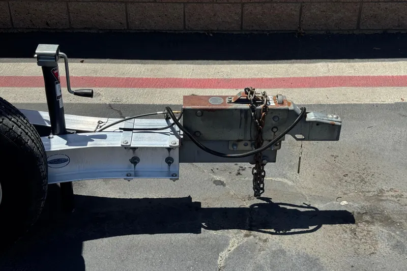 Slide: The Image of Trailer hitch for 2007 Sea Ray 240 Sundeck, parked on asphalt. - 45