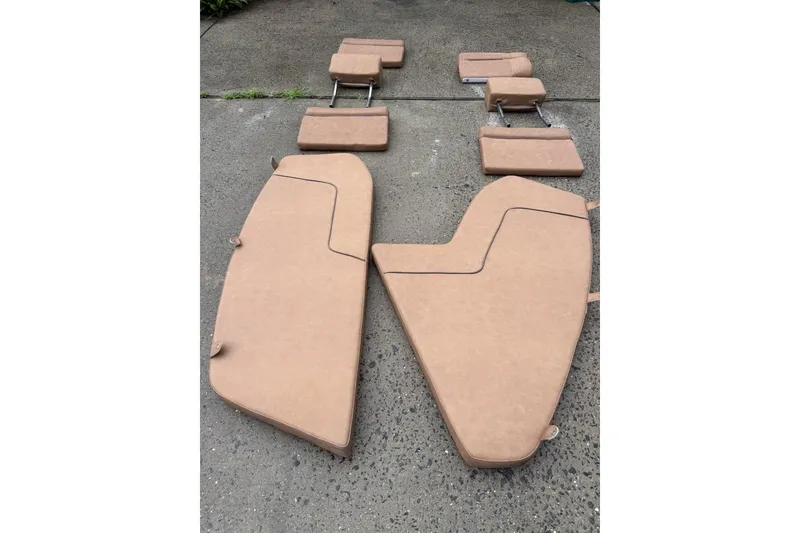 Slide: The Image of Cushion set for 2019 Sea Hunt Ultra 234 boat on concrete surface. - 22
