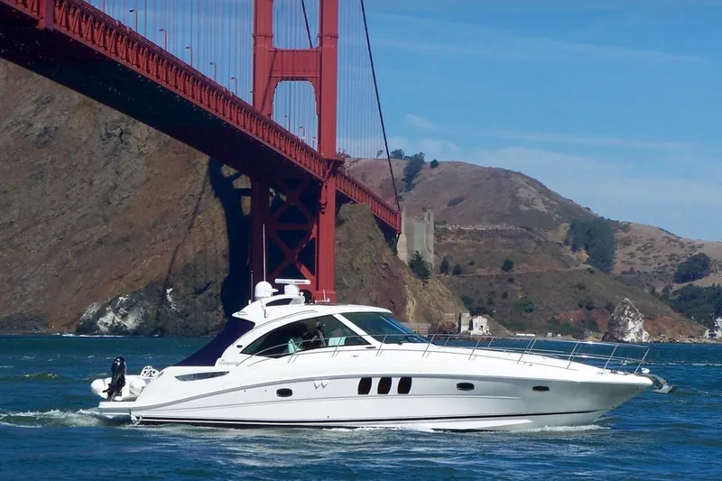 The Image of 2007 Sea Ray 48 Sundancer yacht cruising under Golden Gate Bridge. - 0
