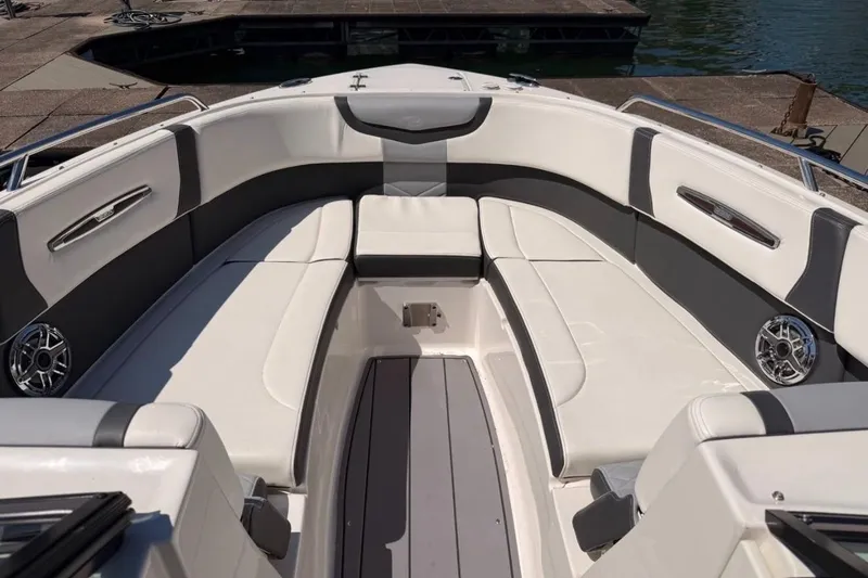 Slide: The Image of 2023 Chaparral 307 SSX boat interior with luxurious seating and modern design. - 7