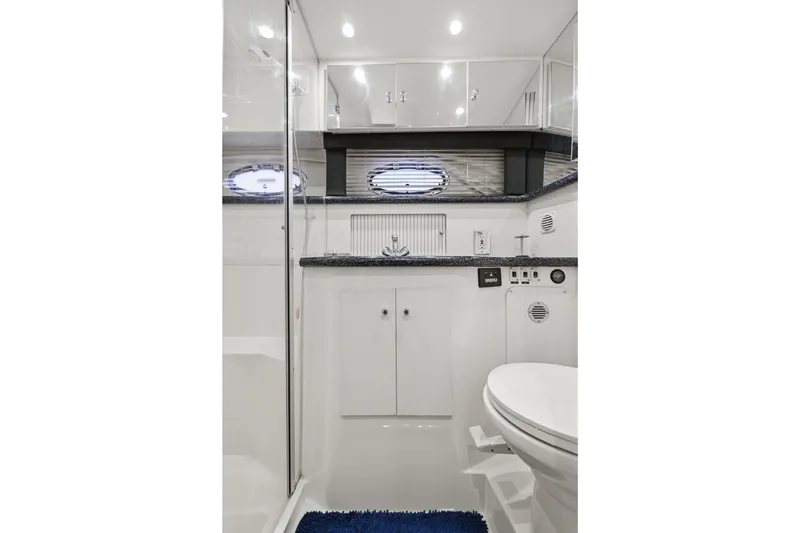 Slide: The Image of Bathroom interior of 2000 Carver 406 Aft Cabin Motor Yacht, featuring modern fixtures. - 66