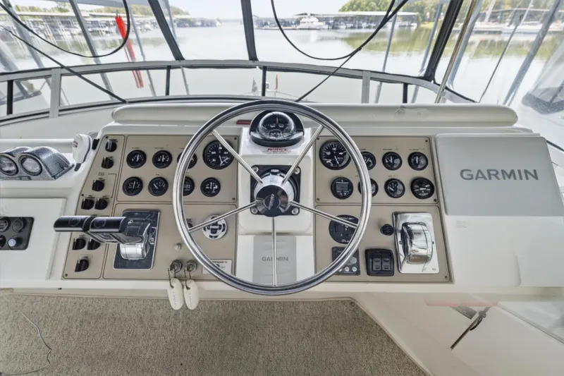 Slide: The Image of Helm of 2000 Carver 406 Aft Cabin Motor Yacht with Garmin navigation system. - 12