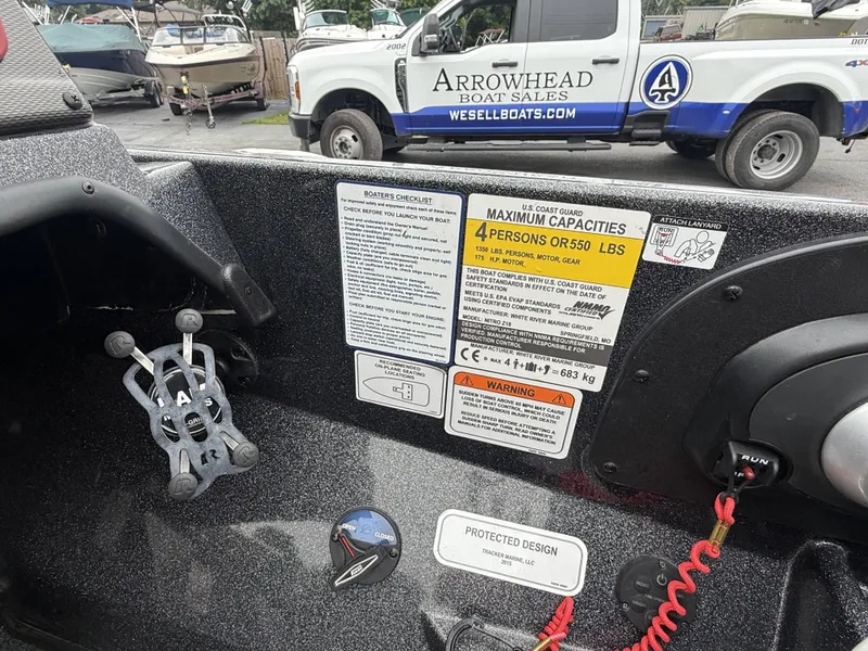 Slide: The Image of Close-up of a Nitro Z18 Pro boat interior with safety and capacity notices. - 8