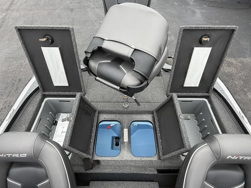 Slide: The Image of Interior view of a Nitro Z18 Pro boat with open storage compartments and an inverted seat. - 4