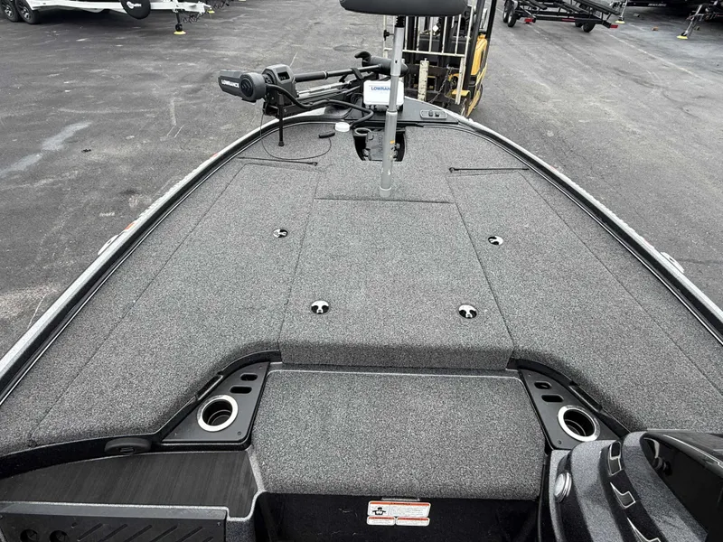 Slide: The Image of The image shows the deck of a 2023 Nitro Z18 Pro boat with gray carpeting. - 10