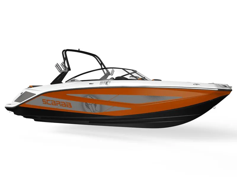 Slide: The Image of 2026 Scarab 255 LX Wake in orange and white with a sporty design and tower. - 2