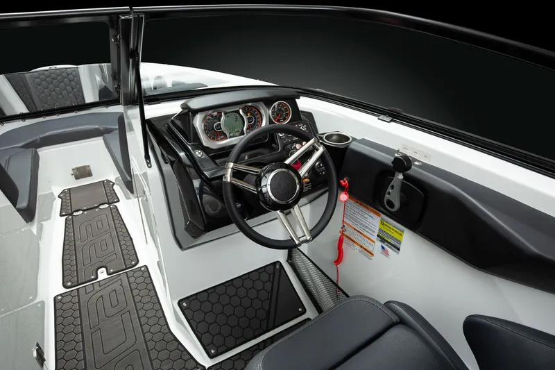 Slide: The Image of The image shows the cockpit of a 2026 Scarab 255 LX boat with modern instruments. - 8