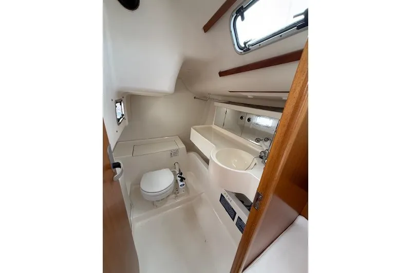 Slide: The Image of Interior of 2000 X-Yachts X-362 Sport yacht bathroom with toilet and sink. - 25