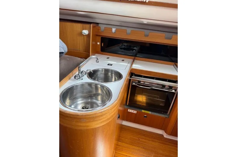 Slide: The Image of 2000 X-Yachts X-362 Sport yacht kitchen with dual sinks and oven. - 13