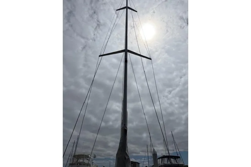 Slide: The Image of Mast of 2000 X-Yachts X-362 Sport sailboat under cloudy sky. - 30