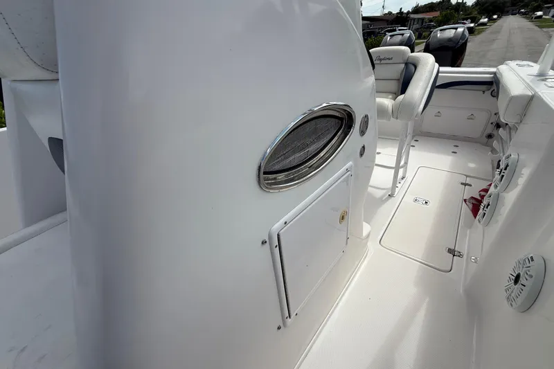 Slide: The Image of 2007 Donzi 29 ZF Open boat interior, featuring seating and storage compartments. - 51