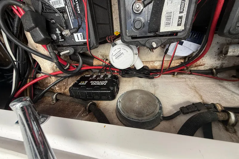 Slide: The Image of Electrical components and wiring inside a 2007 Donzi 29 ZF Open boat. - 13