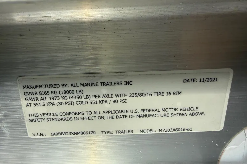 Slide: The Image of Label on trailer by All Marine Trailers Inc, dated 11/2021, showing weight specifications. - 63