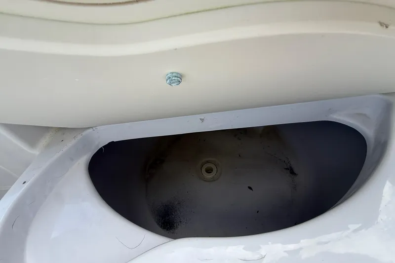 Slide: The Image of Storage compartment of a 2007 Donzi 29 ZF Open boat, showing interior details. - 15