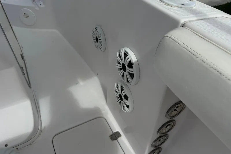 Slide: The Image of 2007 Donzi 29 ZF Open boat interior with speakers and seating detail. - 59