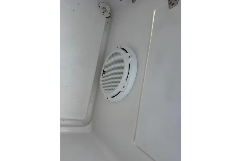 Slide: The Image of 2007 Donzi 29 ZF Open boat interior with a white speaker grille. - 57