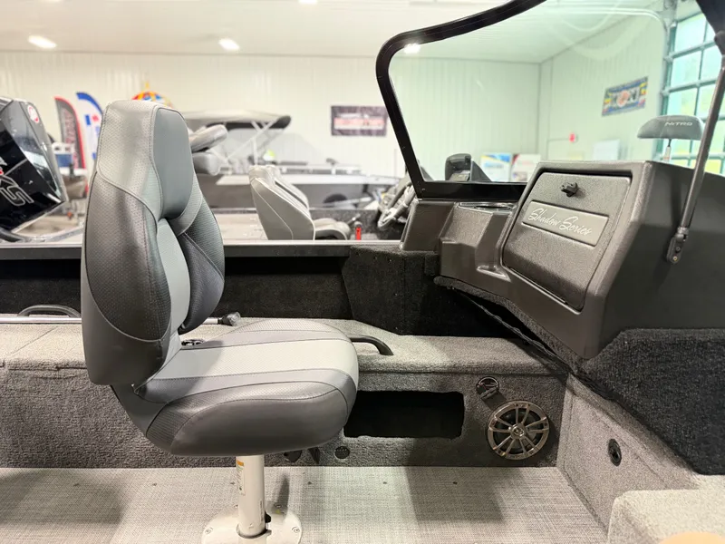Slide: The Image of Interior of an Alumacraft Competitor Shadow 175 Sport with a gray seat and control console. - 15