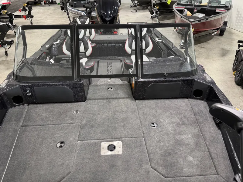 Slide: The Image of The image shows the cockpit of a Skeeter WXR1910F boat with multiple seats. - 18