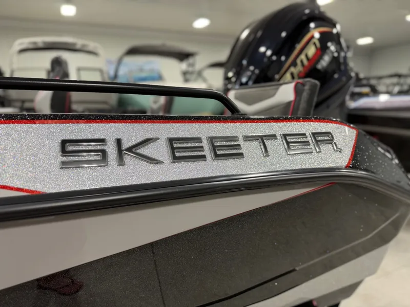 Slide: The Image of Close-up of the 2026 Skeeter WXR1910F with a shiny logo. - 38