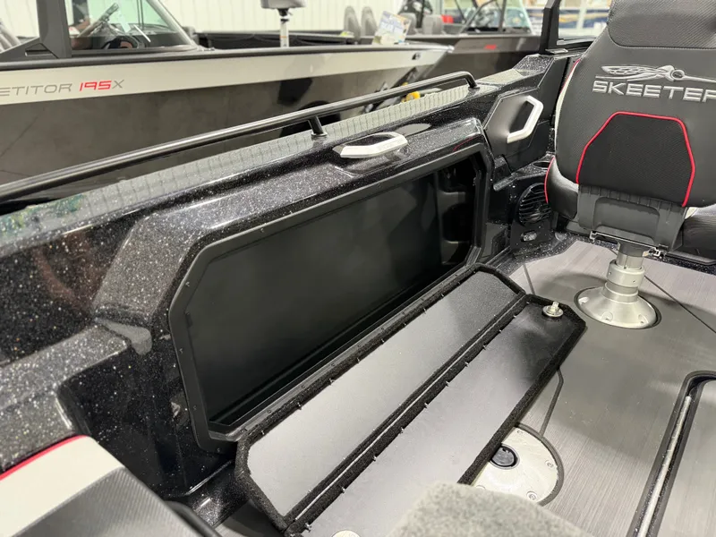 Slide: The Image of The image shows the cockpit of a Skeeter WXR1910F boat with a modern design. - 24