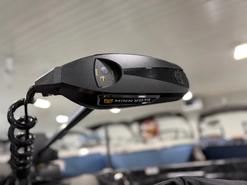 Slide: The Image of Close-up of a Minn Kota trolling motor in an indoor setting. - 6