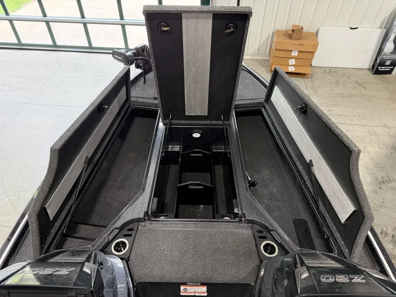 Slide: The Image of Interior view of a 2024 Nitro Z20 Pro boat with storage compartments and engines. - 11