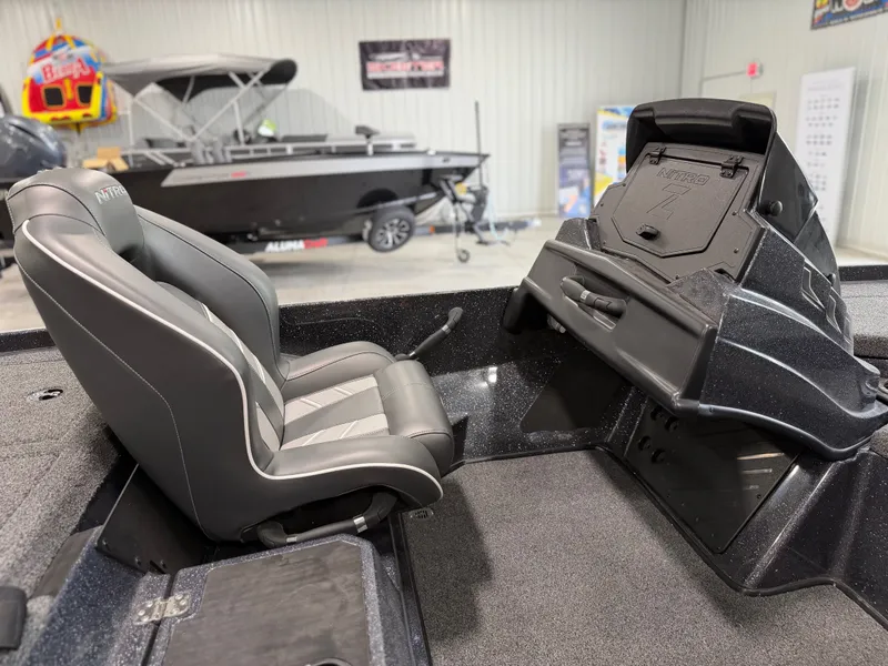 Slide: The Image of Interior of a 2024 Nitro Z20 Pro with a gray seat and control console. - 16