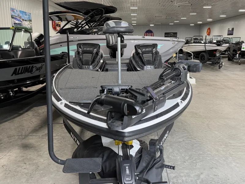 Slide: The Image of 2024 Nitro Z20 Pro in a showroom, featuring a sleek design and fishing equipment. - 3