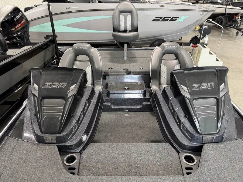Slide: The Image of The image shows the cockpit of a 2024 Nitro Z20 Pro boat with two seats. - 14