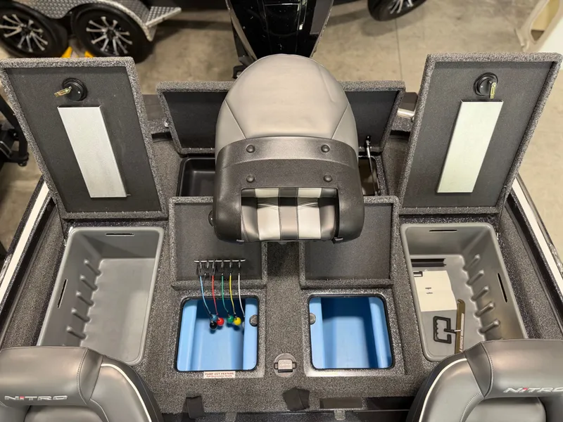 Slide: The Image of Interior view of a 2024 Nitro Z20 Pro boat with seating and storage compartments. - 27