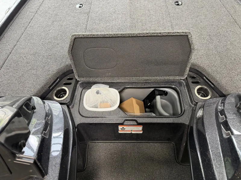 Slide: The Image of The image shows the storage compartment of a 2024 Nitro Z20 Pro boat. - 15