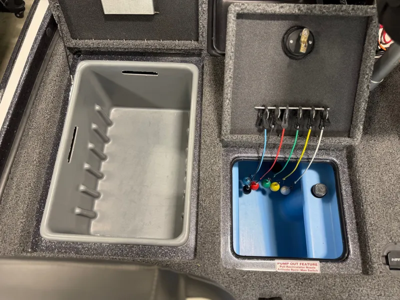 Slide: The Image of Interior view of a 2024 Nitro Z20 Pro with storage compartments and switches. - 28