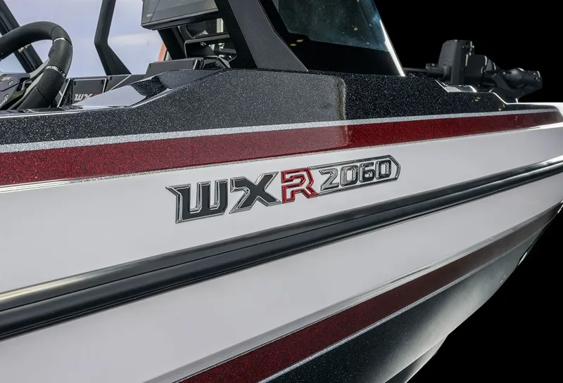 Slide: The Image of Close-up of the Skeeter WXR2060 boat with a sleek hull and modern design. - 42