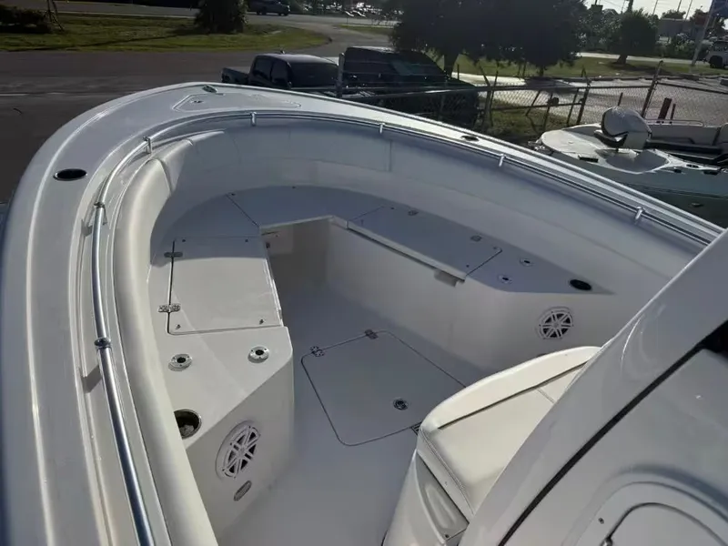 Slide: The Image of The image shows the bow area of a 2025 Sportsman Open 232 Center Console boat. - 17