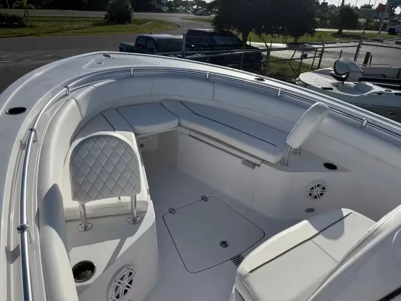 Slide: The Image of The image shows the bow area of a 2025 Sportsman Open 232 Center Console boat. - 16