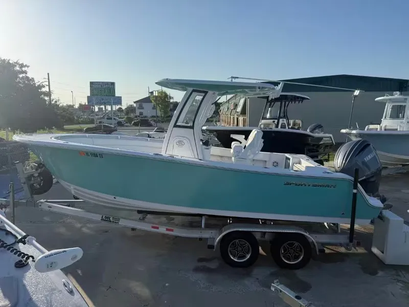 Slide: The Image of 2025 Sportsman Open 232 Center Console parked on a trailer outdoors. - 3