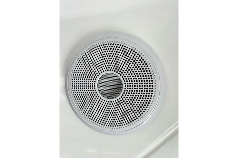Slide: The Image of Speaker grille on 2023 Beneteau Antares 8 boat, featuring a circular design. - 69