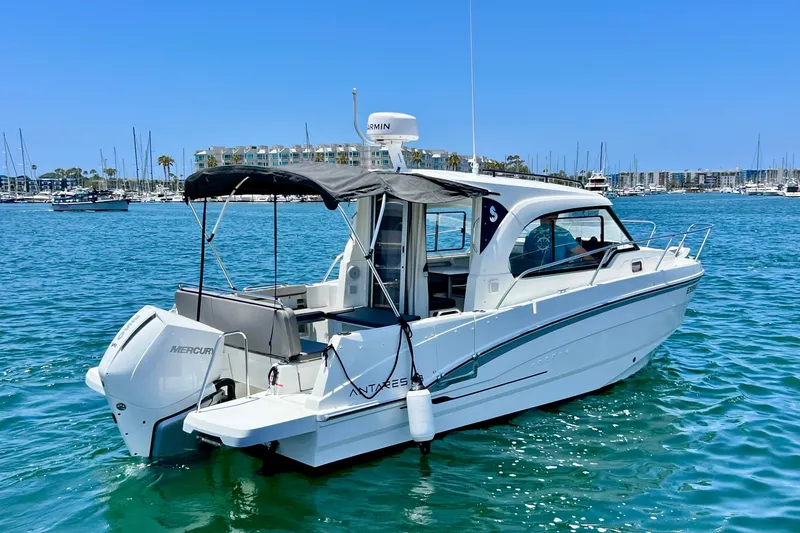 Slide: The Image of 2023 Beneteau Antares 8 boat on water, featuring sleek design and Mercury engine. - 6