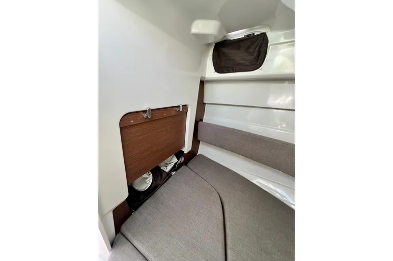 Slide: The Image of Interior cabin of 2023 Beneteau Antares 8 with cozy seating and wooden accents. - 72