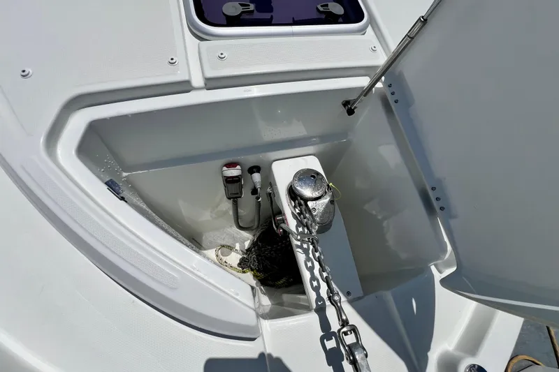 Slide: The Image of Anchor compartment of 2023 Beneteau Antares 8 boat with chain and winch. - 22