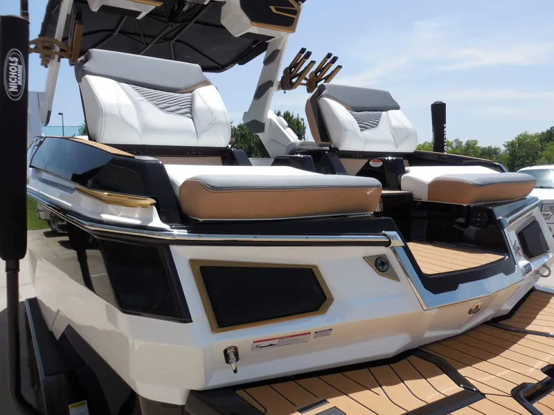 Slide: The Image of Two luxurious seats on a modern boat with stylish design and wood accents. - 14