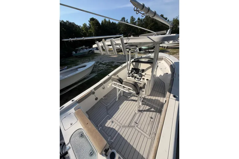 Slide: The Image of 2020 Sea Pro 259 Center Console boat with spacious deck and modern helm. - 5