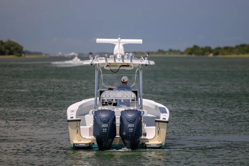 Slide: The Image of Albury Brothers 27 boat from 2011 cruising on a calm waterway. - 6