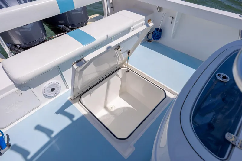 Slide: The Image of Open storage compartment on 2011 Albury Brothers 27 boat deck. - 20