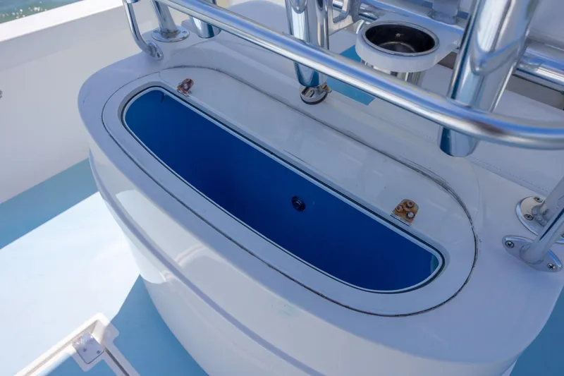 Slide: The Image of Livewell on 2011 Albury Brothers 27 boat, featuring stainless steel fittings. - 24