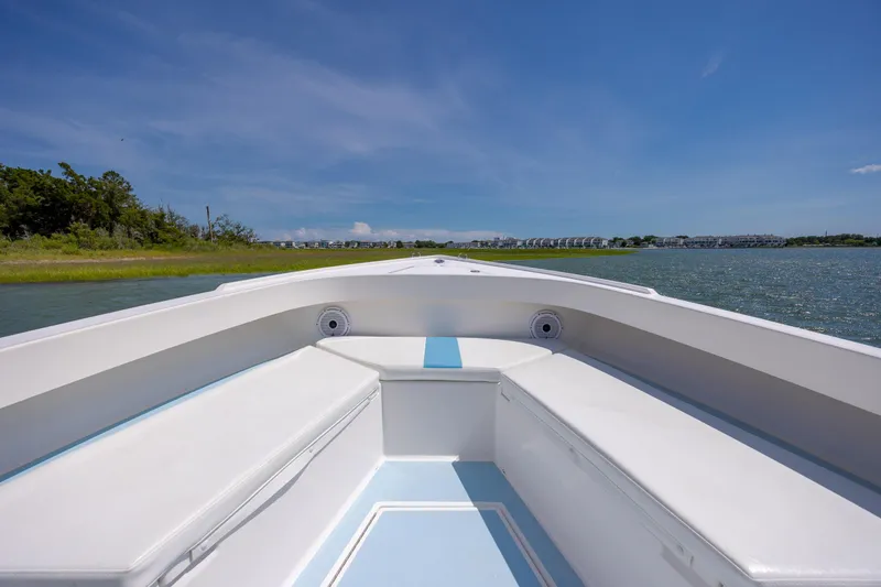 Slide: The Image of Bow view of 2011 Albury Brothers 27 boat on a sunny day, near shoreline. - 10