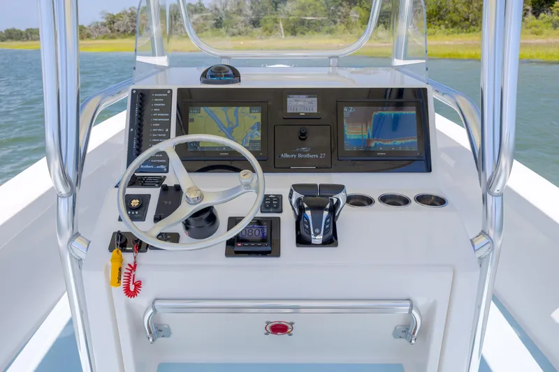 Slide: The Image of Cockpit of 2011 Albury Brothers 27 boat with navigation and control systems. - 16