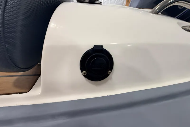 Slide: The Image of 2014 Walker Bay Generation 450 DLX boat detail with black plug socket. - 8