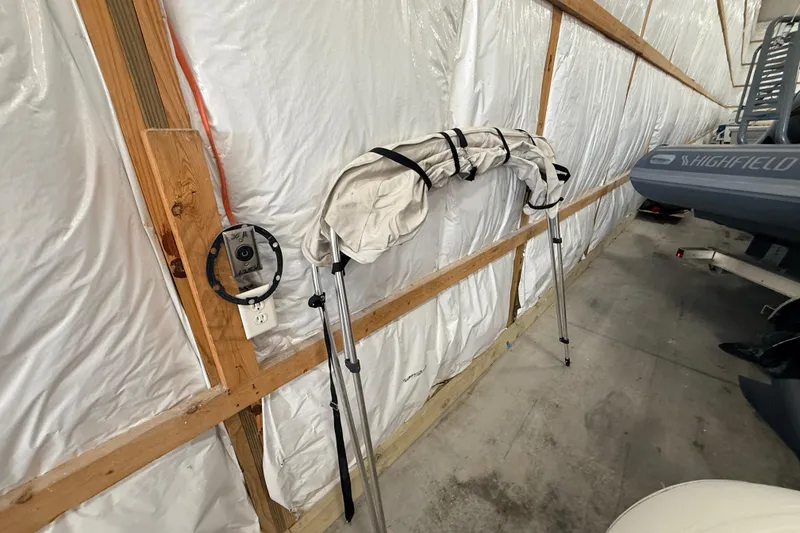 Slide: The Image of Stored boat equipment in a garage with Walker Bay Generation 450 DLX, 2014 model. - 22